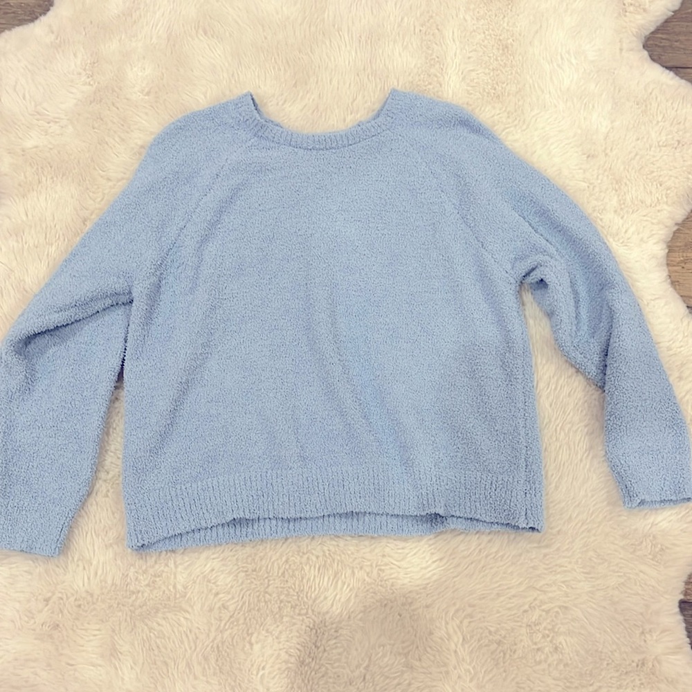 A blue Copper Key sweater, XL.